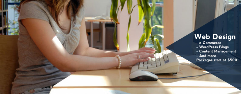 Picture of woman at computer.